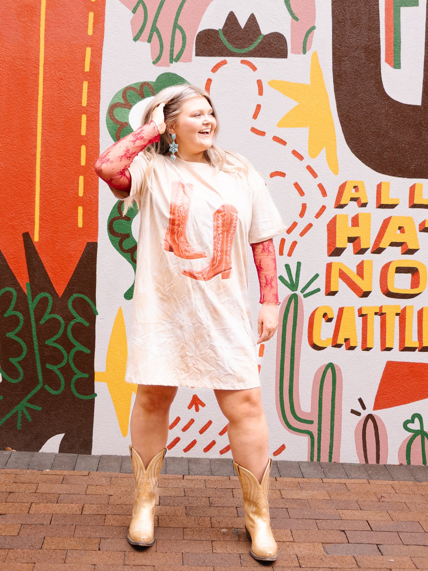 Red Cowgirl Boots on Beige Tie Dye T-Shirt Dress