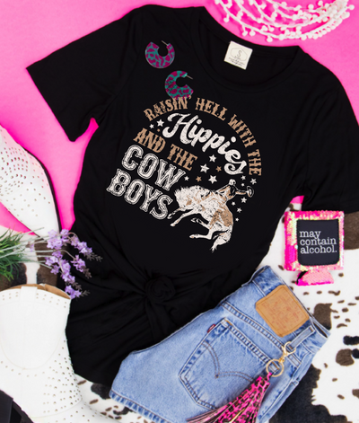 Raisin Hell Whit the HIPPIES and the COWBOYS on Black Crewneck Tee