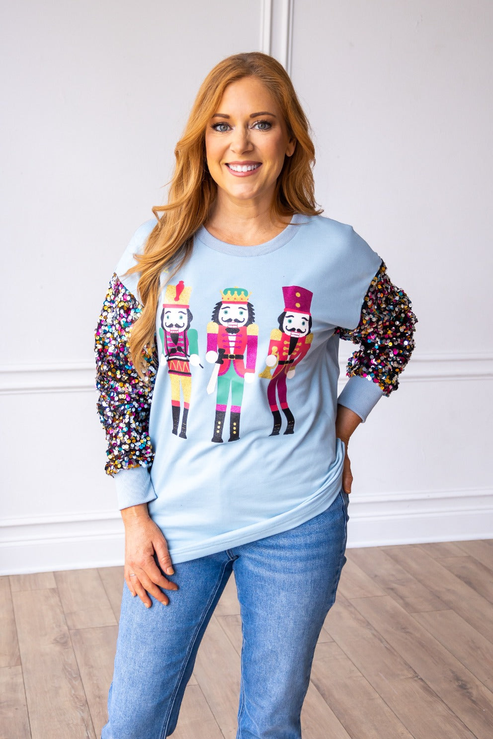 Nutcrackers on Blue Top with Sequin Sleeves