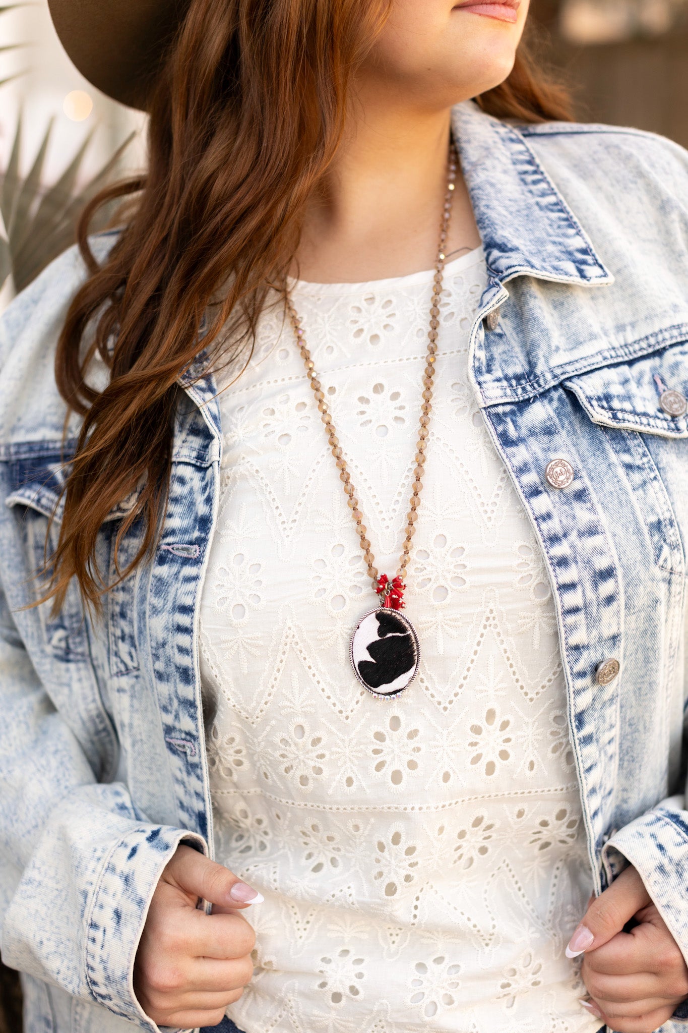 Dazzling Winter Nights in a Clear Cowhide Oval Pendant Necklace
