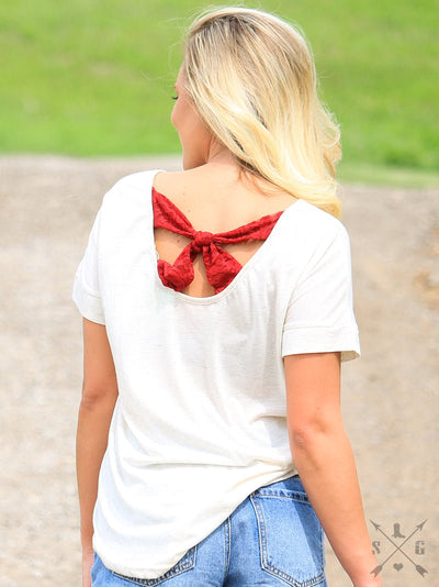 Nashville Boot on Heathered Beige Tee with Bow Back Detail