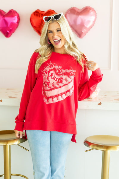 Kiss Cake on Red Sweatshirt