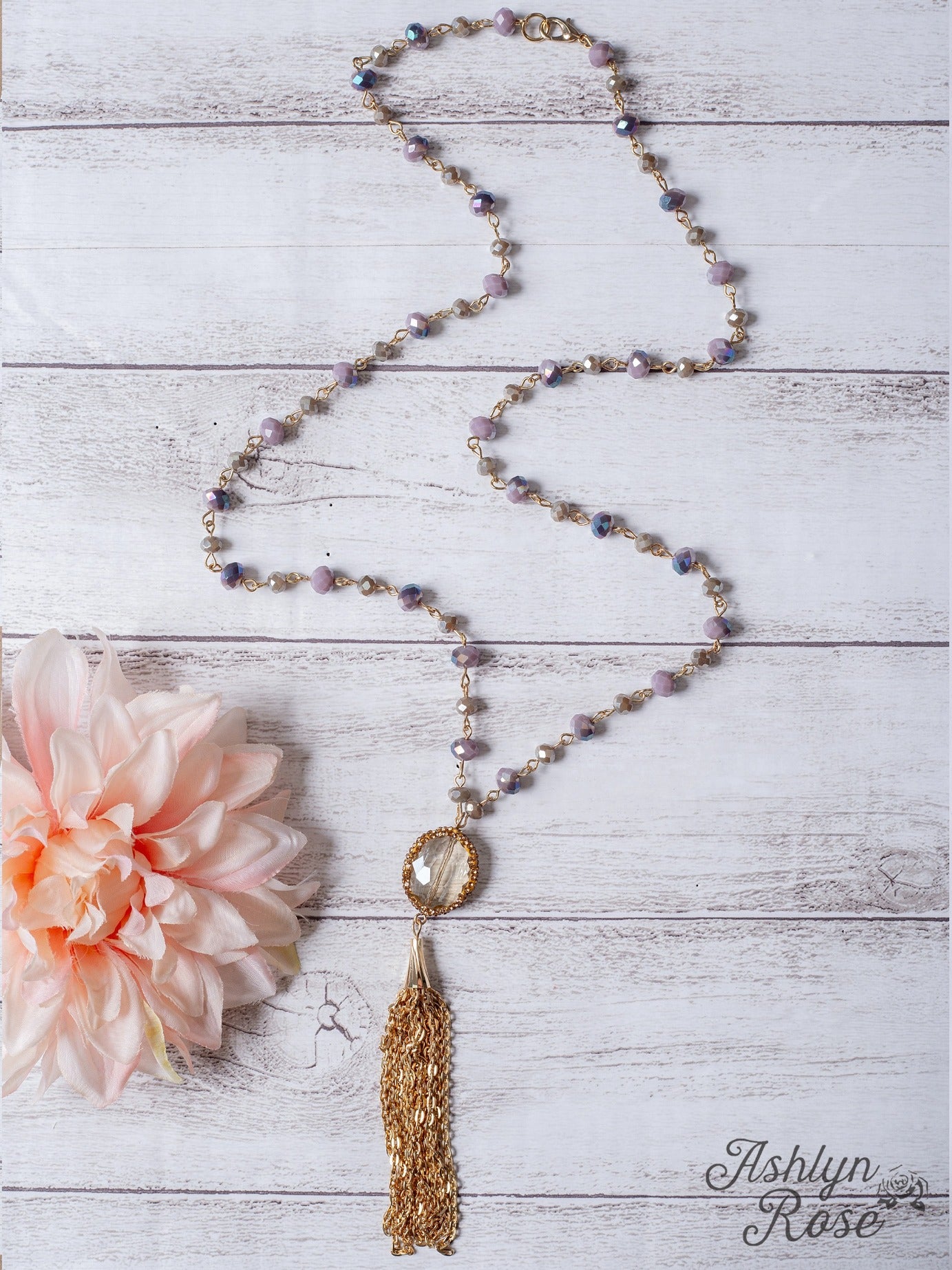 SASSY IN THE CITY CLEAR CRYSTAL GOLD CHAIN TASSEL PENDANT ON A LAVENDER CRYSTAL BEADED NECKLACE