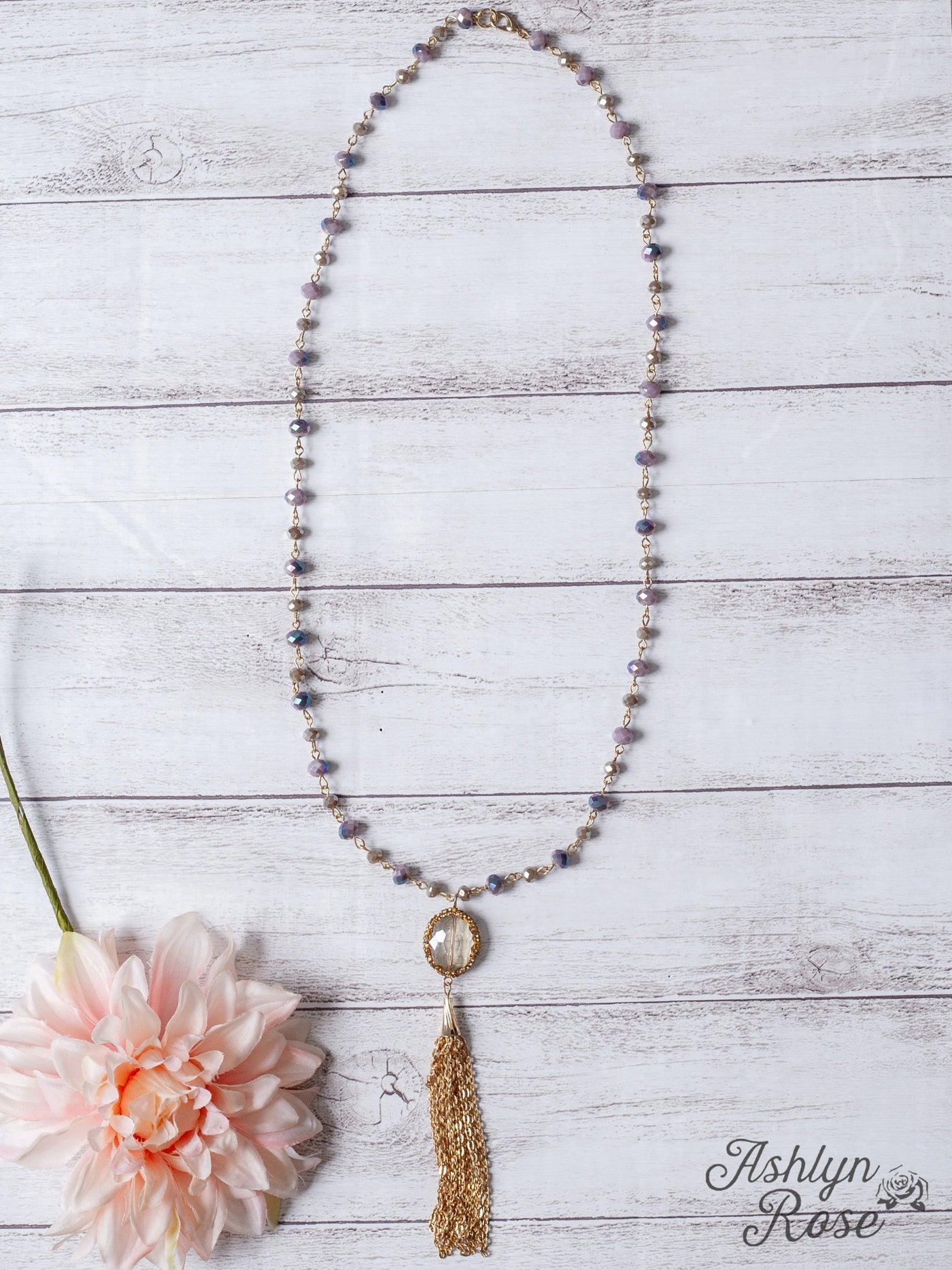 SASSY IN THE CITY CLEAR CRYSTAL GOLD CHAIN TASSEL PENDANT ON A LAVENDER CRYSTAL BEADED NECKLACE