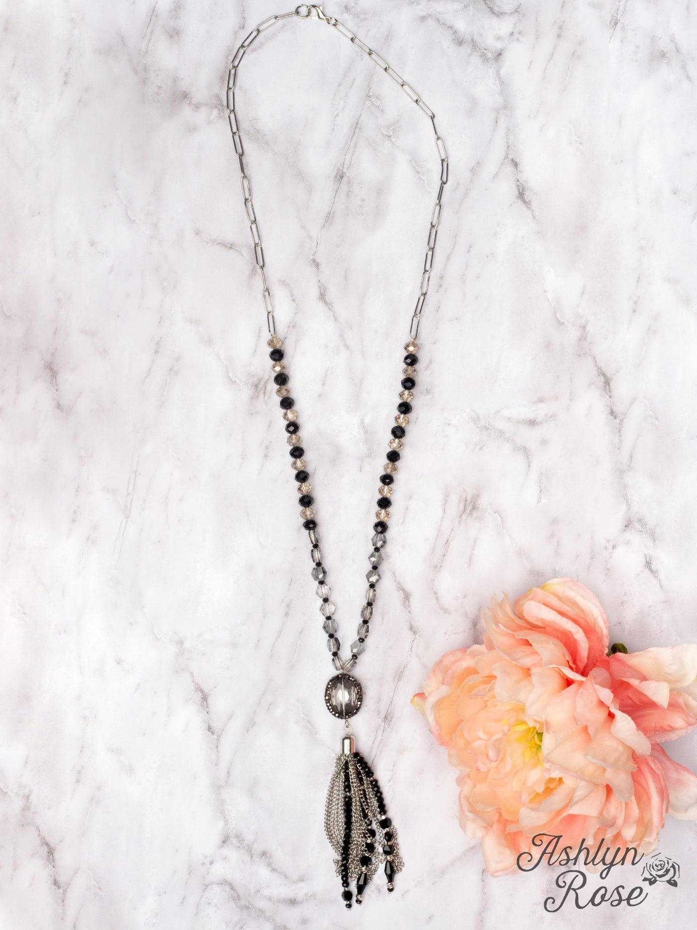 ROSÉ ALL DAY CLEAR BLACK CRYSTAL TASSEL PENDANT ON A SILVER LINKED CHAIN GREY BEADED NECKLACE