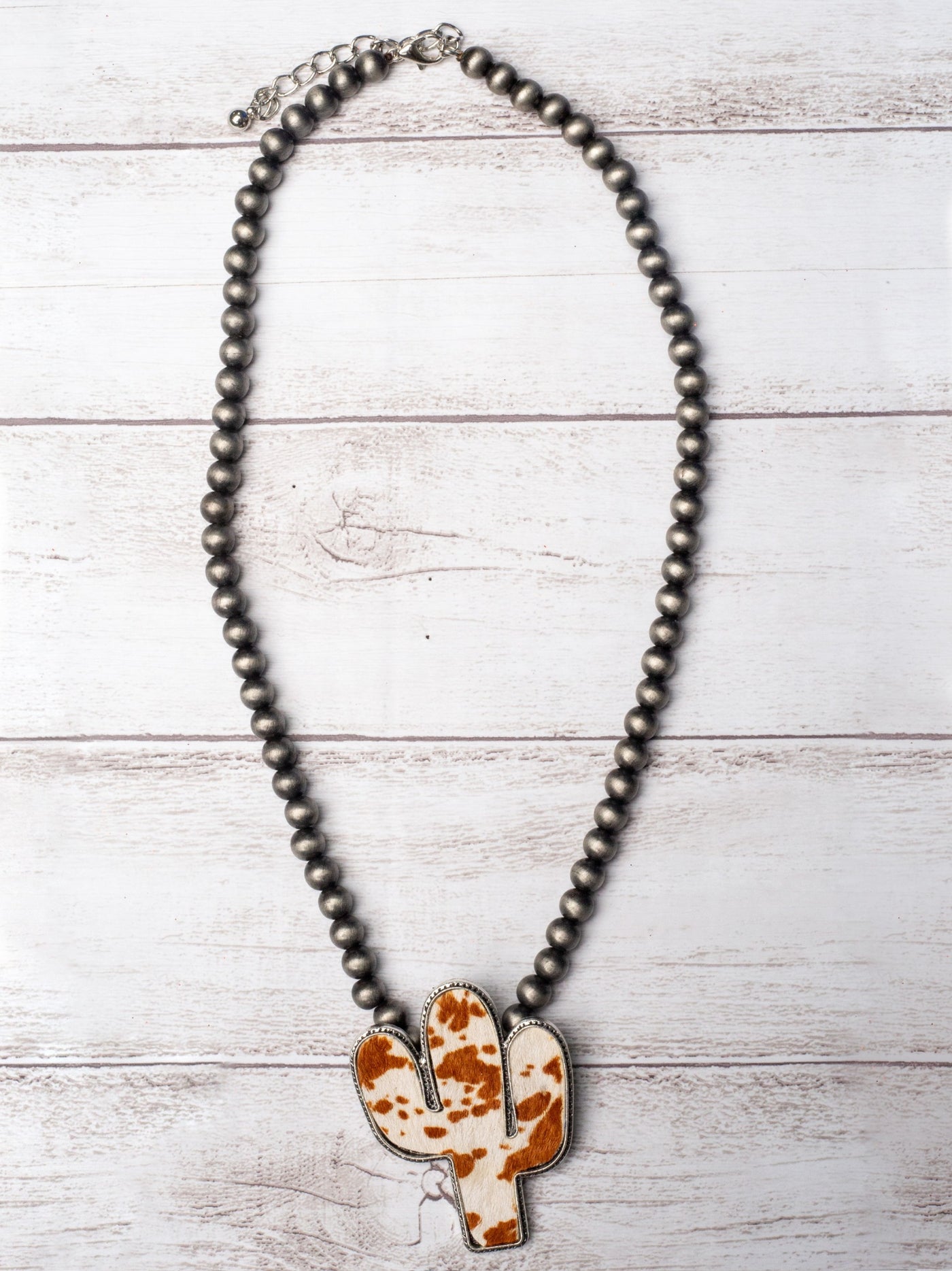 WANTED AND WILD LIGHT BROWN COWHIDE CACTUS PENDANT ON NAVAJO PEARLS NECKLACE