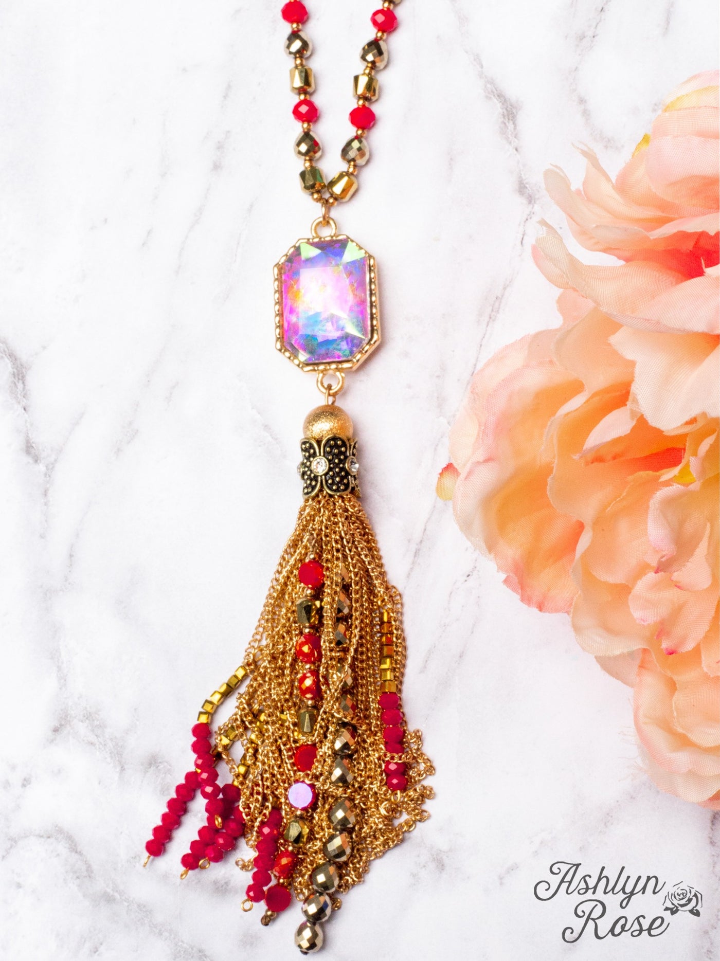 WATCH THE SUNSET WITH ME IRIDESCENT PENDANT WITH GOLD CHAIN TASSELS ON A MIXED CRYSTAL BEADED NECKLACE, RED