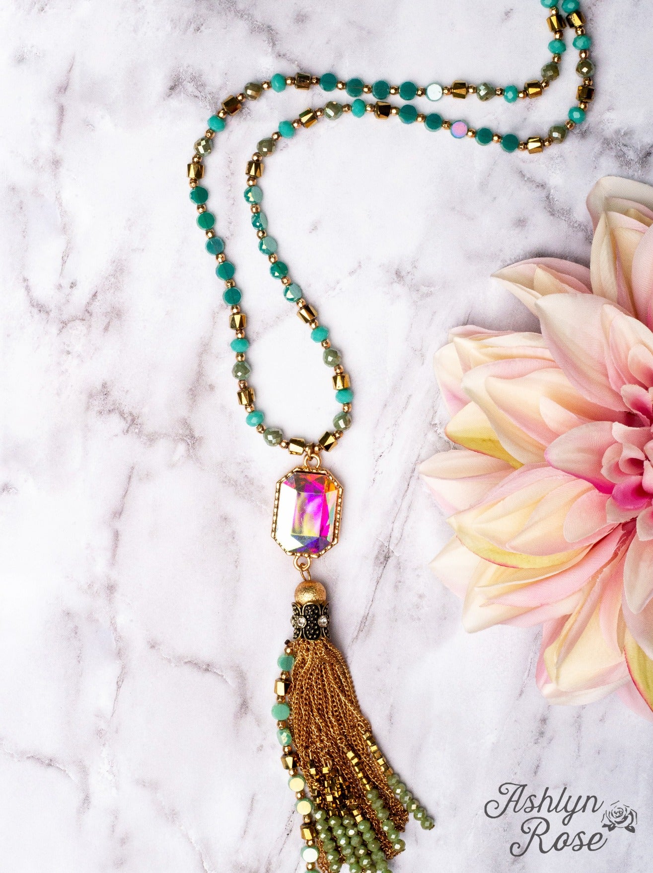 WATCH THE SUNSET WITH ME IRIDESCENT PENDANT WITH GOLD CHAIN TASSELS ON A MIXED CRYSTAL BEADED NECKLACE, TURQUOISE