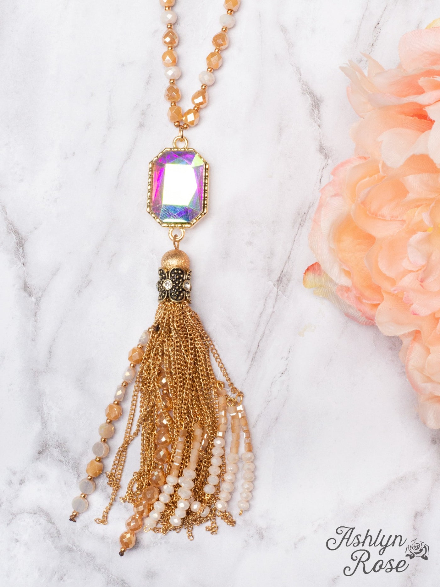 WATCH THE SUNSET WITH ME IRIDESCENT PENDANT WITH GOLD CHAIN TASSELS ON A MIXED CRYSTAL BEADED NECKLACE, WHITE