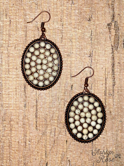 Bumpily Bamboozled Bronze Earrings With A Cream Pendant